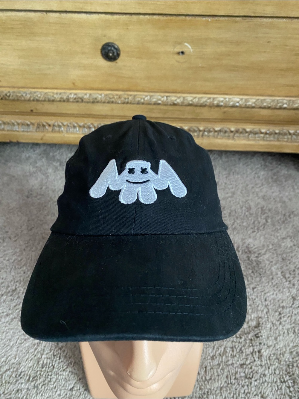 Black Baseball Cap with White Embroidered Mascot